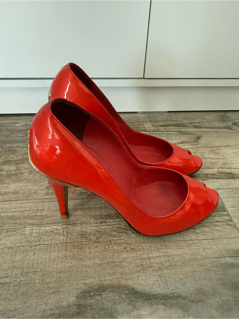 CHANEL glossy red
